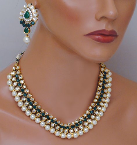 Goldpolish emerald green and white kundan set-2179