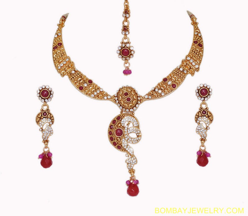 goldplated ruby red and white polki set with tikka