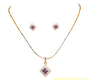 goldplated and silverplated purple and white diamond pendent set