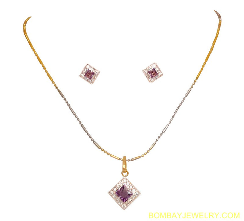 goldplated and silverplated purple and white diamond pendent set