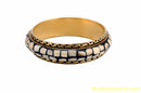 black bangle  white and golden degine