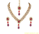 goldplated pink and white kundan set with tikka