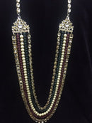 Goldpolish mehroon, green and white kundan set
