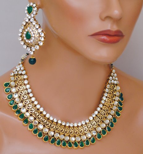Goldpolish Emerald green and white kundan set-2126