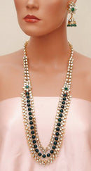 Goldpolish emrald green and white kundan set