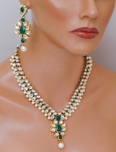 Goldpolish emerald green and white kundan set-2175