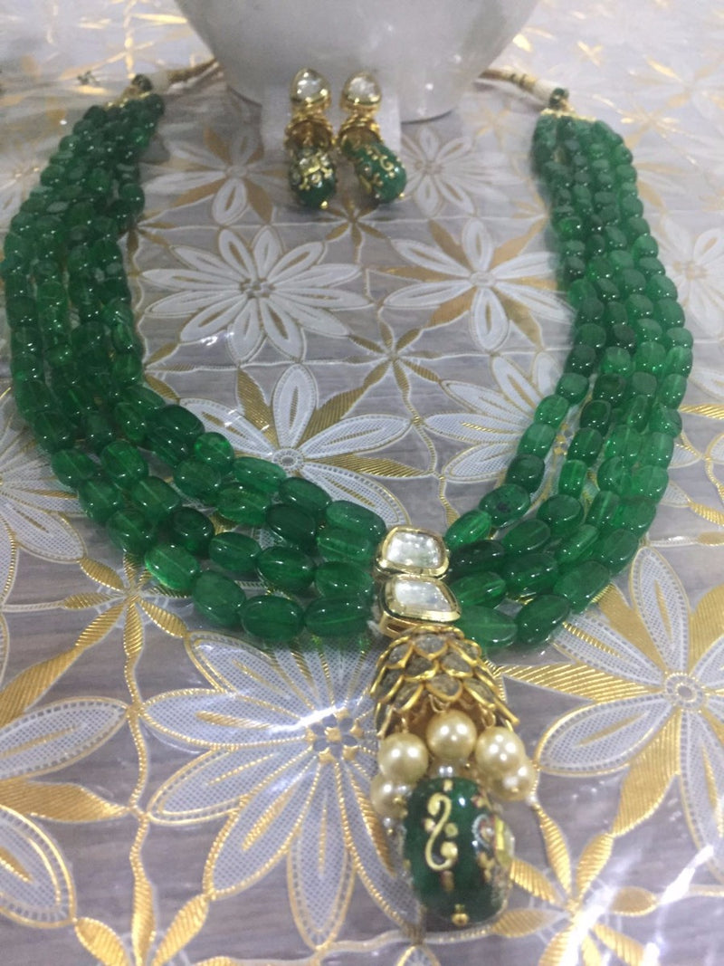 Beautiful emerald green golden set-1100