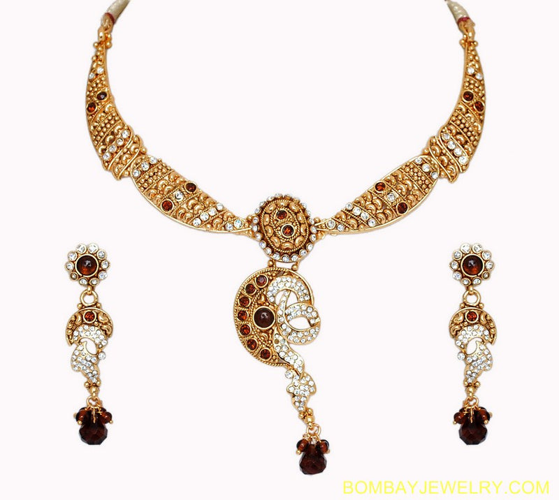goldplated brown and white polki set