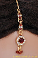 goldplated marron and white polki set with tikka