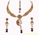 goldplated marron and white polki set with tikka